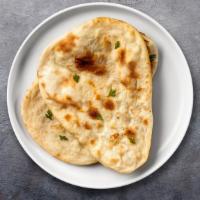 Paneer Wise Kulcha · Naan bread cooked with cottage cheese cubes and mild spices.