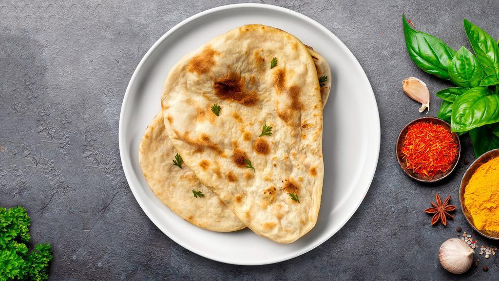 Paneer Wise Kulcha · Naan bread cooked with cottage cheese cubes and mild spices.