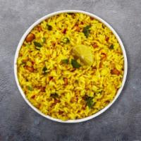 Lemon Garnish Rice · Freshly cooked basmati rice flavored with lemon.