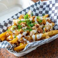 Loaded Fries · Sour Cream, Green Onions, House Cheese Sauce & Bacon.
