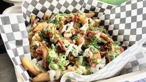 Spicy Pork Belly Fries · Korean Style Spicy Pork Belly,
Cilantro-Jalapeno Aioli, Sour
Cream, House Cheese Sauce, Kim
Chee, Pickled Jalapeno, and
Green Onion.