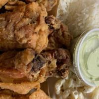Classic Fried Chicken Plate · Classic Fried Chicken with Choice of Dipping Sauce, Served with
Rice and Mac Salad. (5-7) pc...