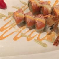 Fire Island Roll · Shrimp tempura avocado inside topped with seared salmon and served with spicy mayo honey was...