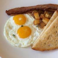 Bacon & Eggs · Two eggs any style, bacon, breakfast potatoes, and toast.
