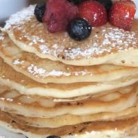 Pancakes · Two thick and fluffy buttermilk pancakes + bacon