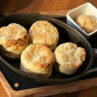 Fresh Baked Bacon Biscuits (4) · Four fresh baked bacon biscuits with butter