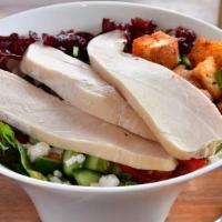 Roasted Chicken Salad · Chicken, Goat cheese, tomatoes, cucumbers, cranberries, croutons, balsamic vinaigrette.