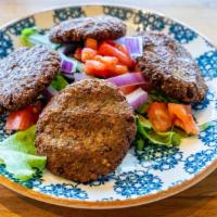 Falafel · Fried chickpea croquettes with tahini sauce.