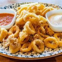 Fried Calamari · Served with tartar and spicy sauce duo. Spicy.