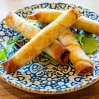 Cigar Borek · Pan fried phyllo rolls, stuffed with Feta cheese and parsley.