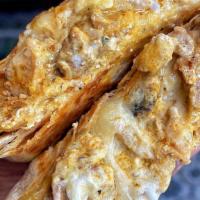 Quesadilla - Pollo Asado · Citrus kissed grilled chicken paired with Habanero salsa

*All Quesadilla Suiza come with ch...