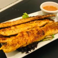 Chicken Satay · Barbecued house marinated chicken served with peanut sauce and cucumber chutney.