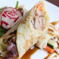 Duck Roll · Crispy duck wrapped with vegetables served with special tamarind sauce.