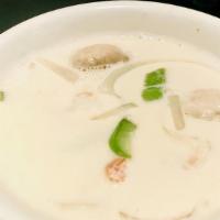 Coconut Tom Kha Soup (Gluten Free And Vegan) · A distinct flavor of Southern Thailand's coconut soup with fresh mushroom seasoned with gala...