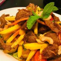 Vegetarian Duck Salad · Tender sliced of roasted vegetarian duck with pineapple, apple, onion, cashews, scallion and...
