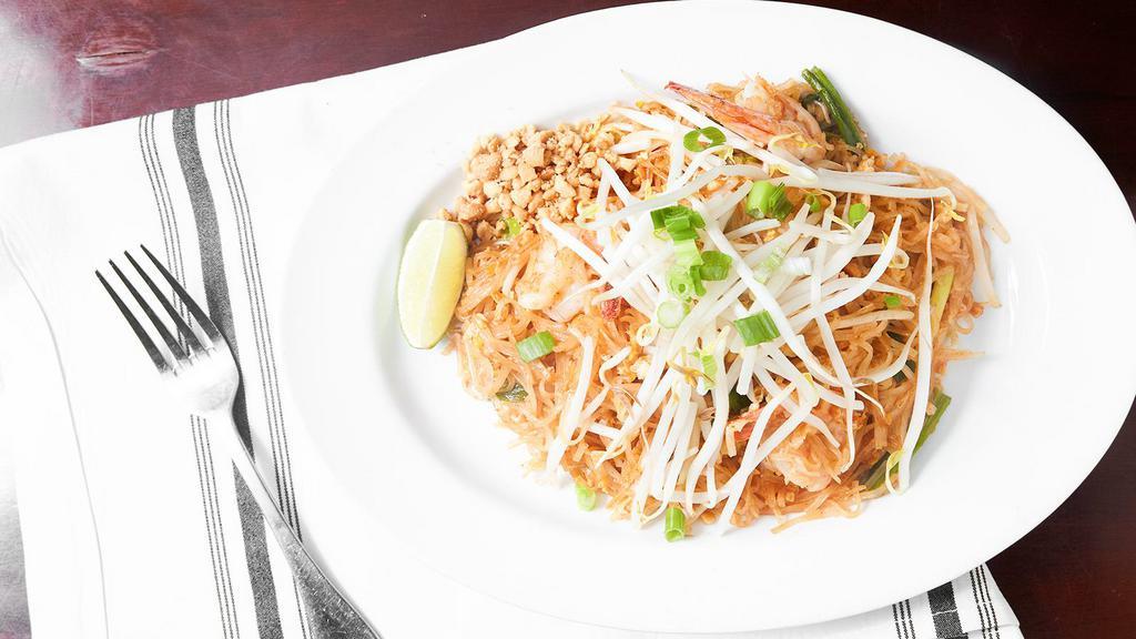 Pad Thai (Gluten Free) · Pan fried Thai rice noodle , egg, bean spout and crushed peanuts.
