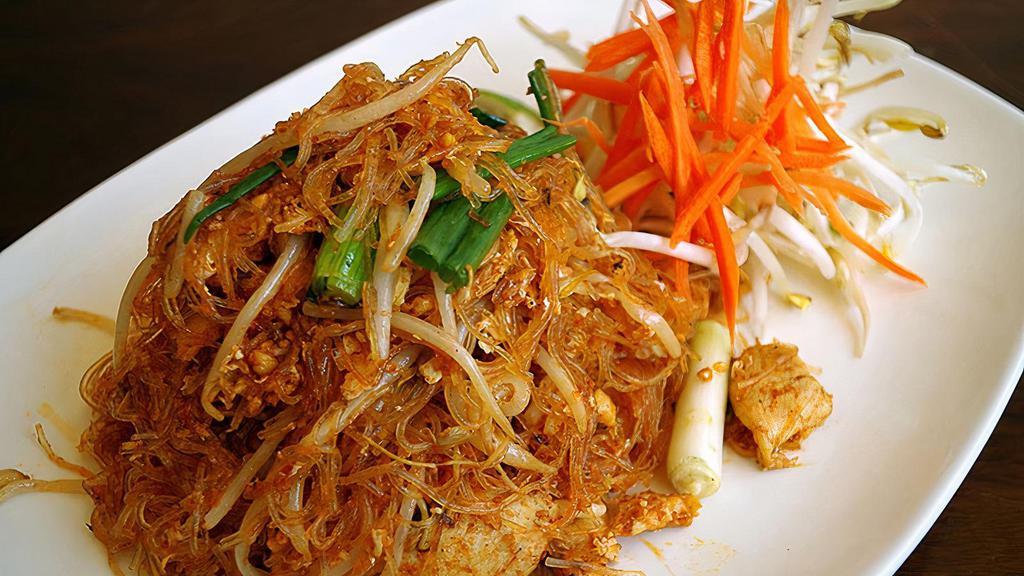 Glass Noodle Pad Thai · Pan fried glass noodle, egg, bean sprout and crushed peanuts.