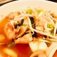 Tom Yum Noodle Soup (Gluten Free) · Rice noodle in spicy Tom Yum broth with Bok choy, bean sprout, and mushroom.