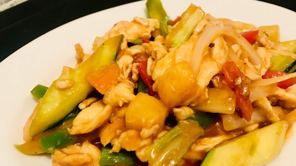 Sweet And Sour Sauce · Sautéed with tomato, pineapple, bell pepper, cucumber, and scallion.