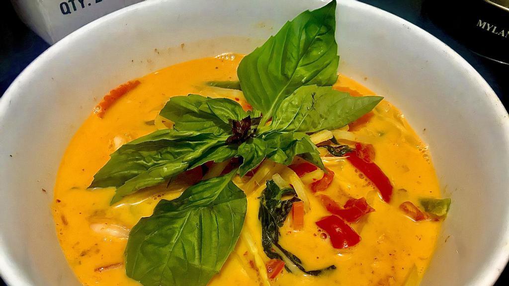 Red Curry ( Vegan) · Spicy curry with bamboo shoot, bell pepper, and basil leaves.