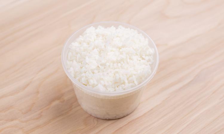 Side White Rice · Two heaping scoops of white rice.