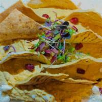 Butternut Hummus · Served w/ Feta Cheese, Pomegranate Seeds & Zaatar Pita Chips
