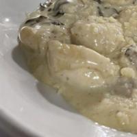 Gnocchi W/ Mushroom Cream Sauce · In house made potato gnocchi pan seared with fresh mushroom, garlic, and cream sauce.