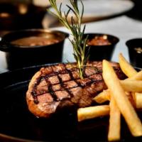 Top Sirloin Steak · Brazilian cut picanha - 1 Top sirloin steak with 2 side orders of your choice.
(All BBQ plat...