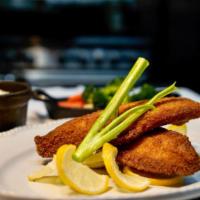 Breaded Tilapia · Breaded tilapia with 2 side orders of your choice and tartar sauce included.