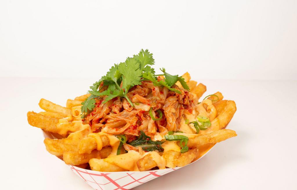 Kimchi Fries · Seasoned & battered french fries topped w/ mild spicy mayo, mild kimchi, chopped scallions, cilantro, & jalapeño
Please notify a staff if you have dietary restrictions or allergies.
