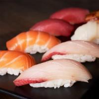 8Pc Nigiri Box · 8pc sushi nigiri with 2pc of tuna, 2pc of salmon, 2pc of hamachi, 2pc chef's special & 1 Cal...