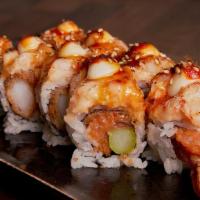 Playbada Roll · Shrimp tempura, spicy tuna, asparagus, lobster salad.