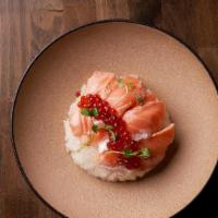 Sake Ikura Don · Seared salmon with ikura over sushi rice.