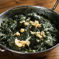 Saag Paneer · Cottage cheese sauteed with delicately spiced spinach.