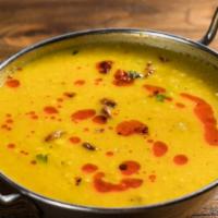 Daal Tadka · Lentil cooked with onion, tomato, cilantro and homemade ghee with aromatic spices.