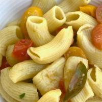 Garlic + Olive Oil + Tomatoes · Our fresh pasta sauteed with garlic, olive oil and fresh tomatoes. Try it with cannellini be...