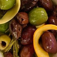 Citrus Olives · A mix of olives marinated with lemon peels and rosemary.