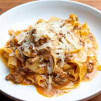 Pappardelle  Bolognese · with pork and veal sugo, Grana Padano DOP
