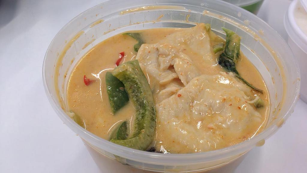 Panang Curry · Spicy. Choice of protein. A thick, rich, red curry cooked with coconut milk, basil leaves, bamboo shoots, and pepper.