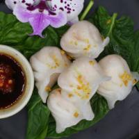 Shrimp Dumpling · Most popular. Steamed shrimp dumpling served with sweet black soy sauce.