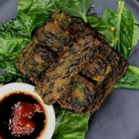 Chive Pancake · Vegetarian. Crunchy pan seared chive pancake served with spicy sweet soy sauce.