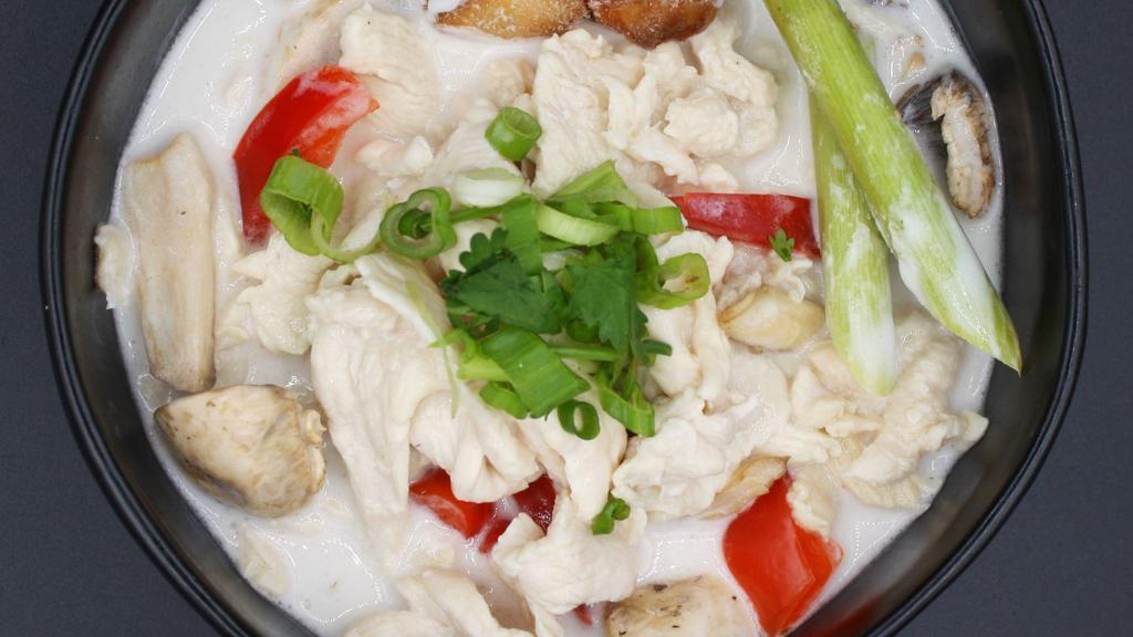 Tom Kha Soup · Gluten-free. Coconut soup and a hint of lime juice, mushrooms, bell pepper, cilantro and galangal.