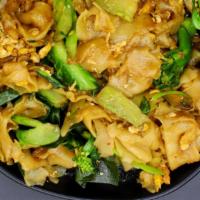 Pad See Ew · Sautéed rice noodles with egg and Chinese broccoli in a sweet yellow bean sauce.