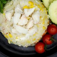Crab Meat Fried Rice · Delicious fried rice with premium lump crabmeat, onions, scallion, tomatoes, carrots, and egg.
