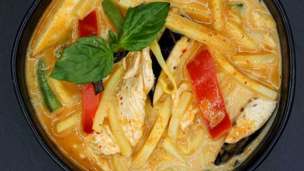 Red Curry (Vegetarian) · Hot red chili paste and light sweet curry in the mix of coconut milk, eggplant, bamboo shoot, basil and bell peppers. Spicy.