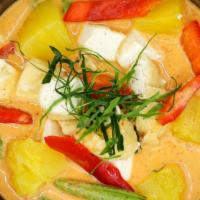 Panang Curry (Vegetarian) · Slightly sweet and spicy with 
 string beans, bell peppers,Carrot and kaffir lime leaves. Sp...