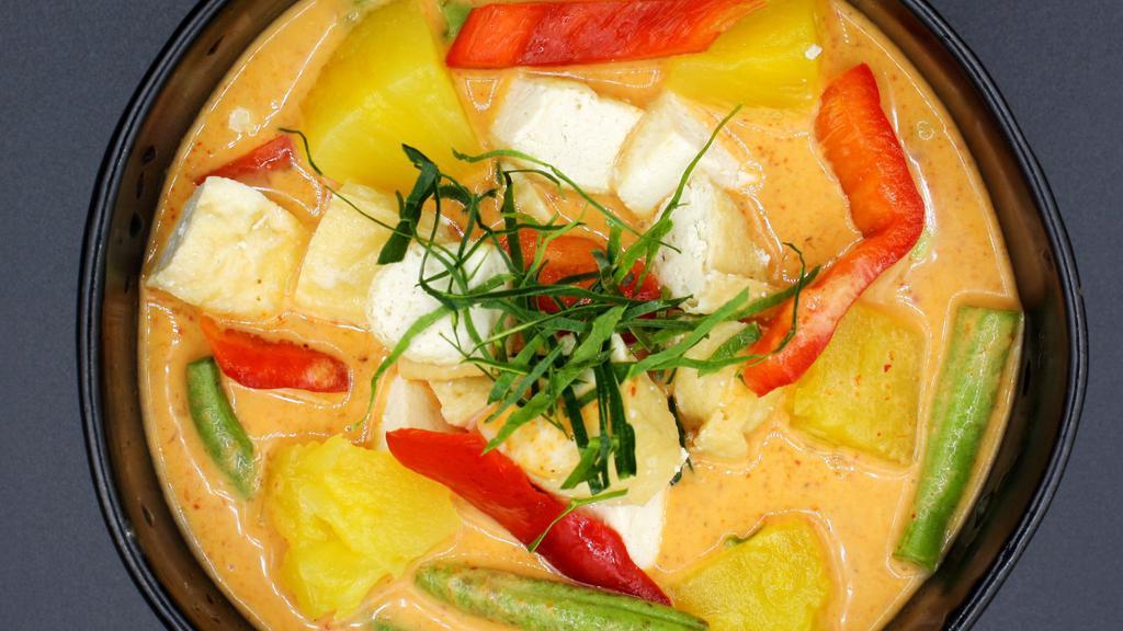 Panang Curry (Vegetarian) · Slightly sweet and spicy with 
 string beans, bell peppers,Carrot and kaffir lime leaves. Spicy.