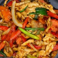 Pad Phrik Phao · A sautéed fresh and delicious blend of onion, carrot, bell pepper, scallion, pineapple in dr...