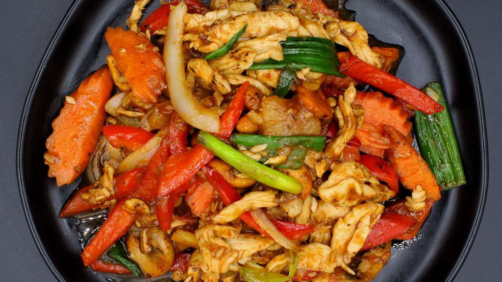 Pad Phrik Phao · A sautéed fresh and delicious blend of onion, carrot, bell pepper, scallion, pineapple in dried chili paste.(Similar to Pad Cashew nut)