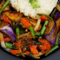 Spicy Eggplant Grapow · Sautéed long purple eggplant with chili, onions, carrots, string beans, and fresh basil. Spi...